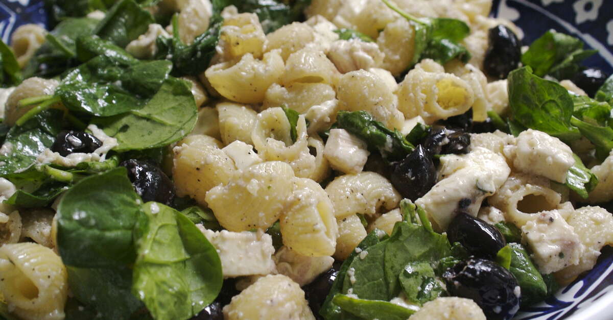 How to Make a Delicious Salad with Pasta, Olives, Spinach, and Mozzarella
