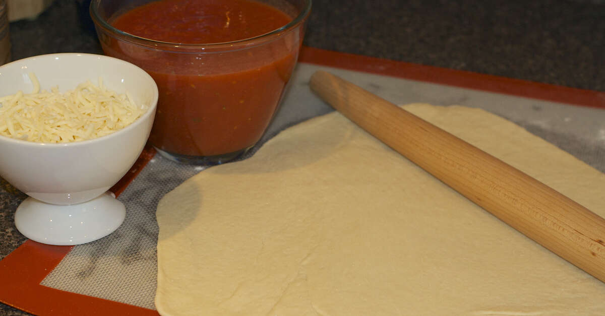 Thin Crust Pizza Dough Recipe - MakeBetterFood.com
